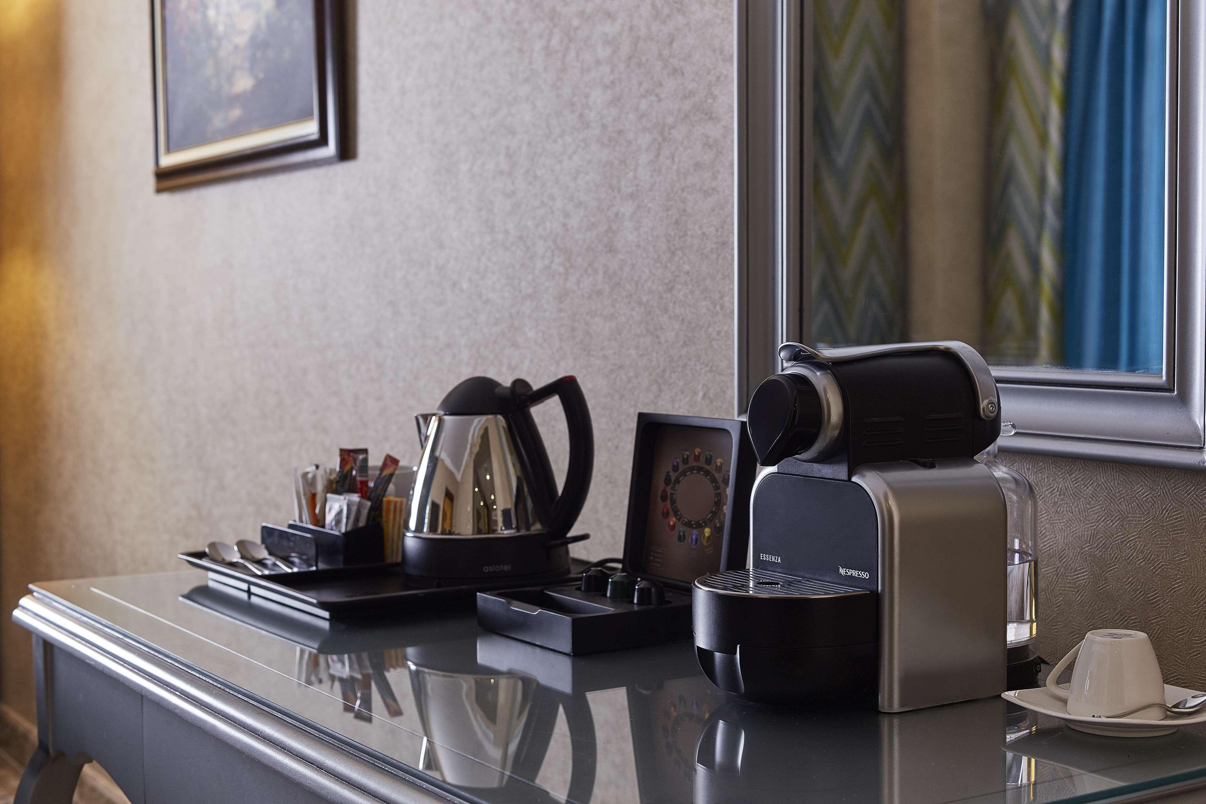 Hilton Alexandria Corniche Hotel Exterior foto A Nespresso machine in a hotel room